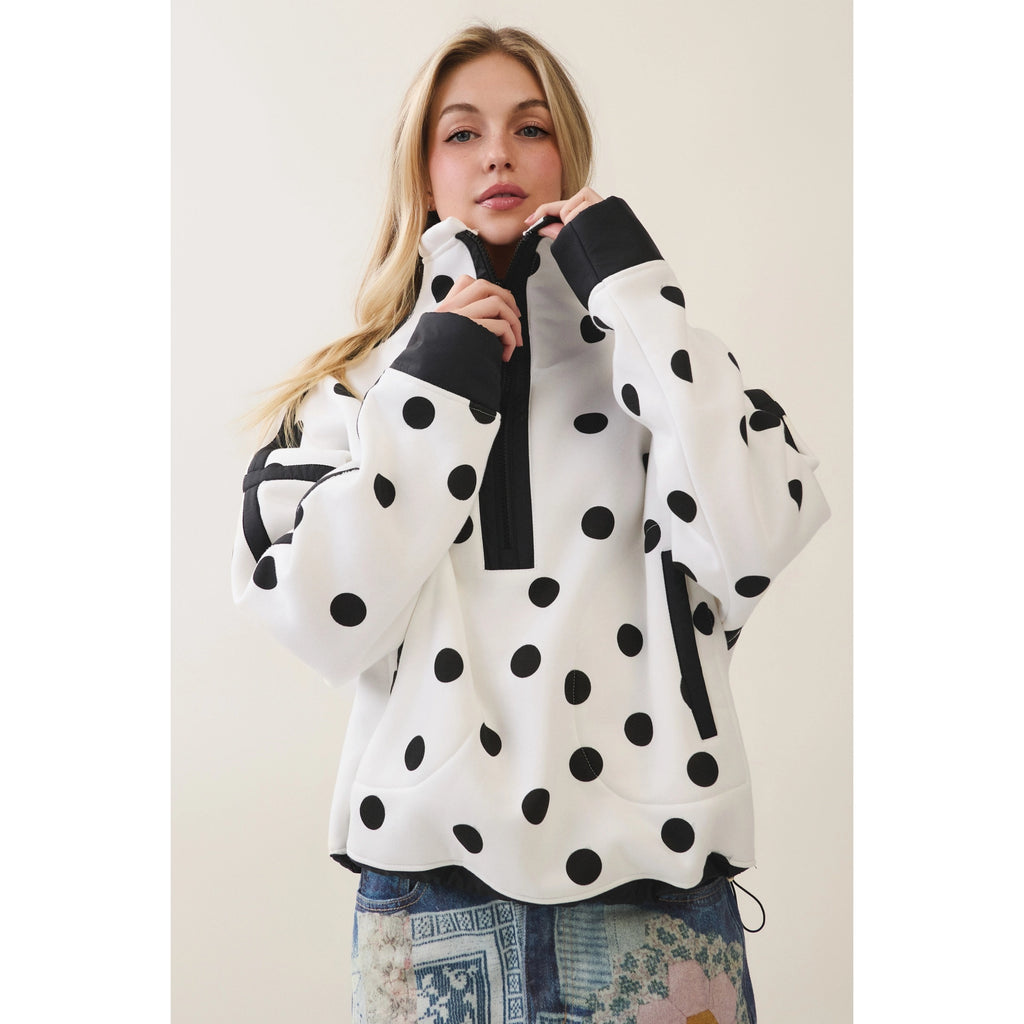 Half zip with polka dot and seam detail