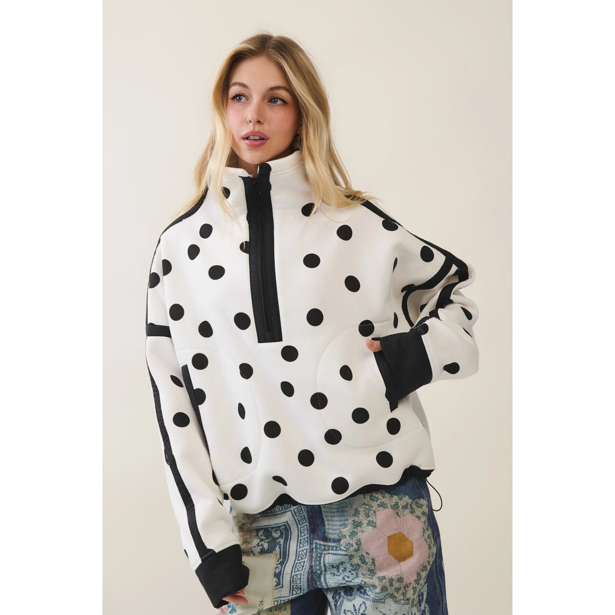 Half zip with polka dot and seam detail