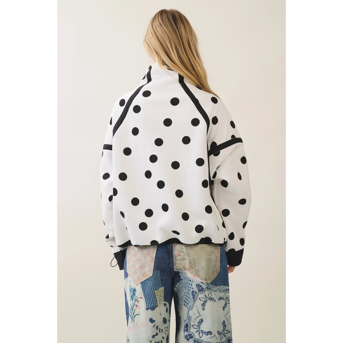 Half zip with polka dot and seam detail
