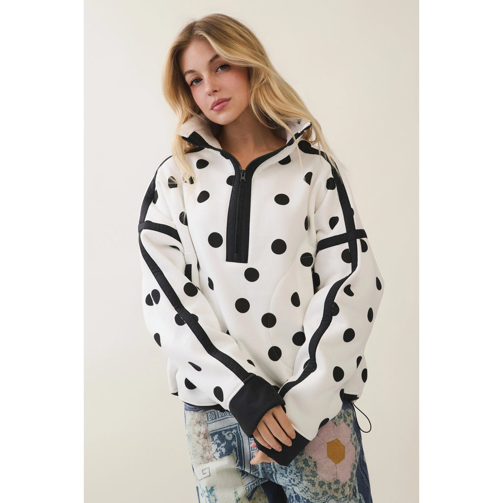 Half zip with polka dot and seam detail